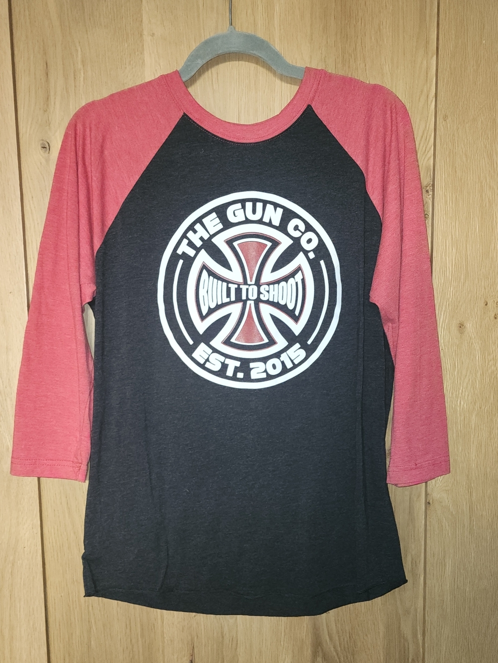Next Level Apparel Black Baseball Tee with Red Raglan Sleeves and Graphic. #0056